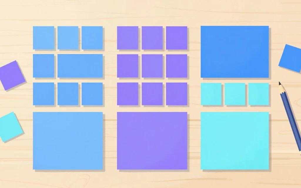 Des carrés de papier bleus, violets et cyan rangés en trois groupes sur une table, quelques-uns encore à l’écart